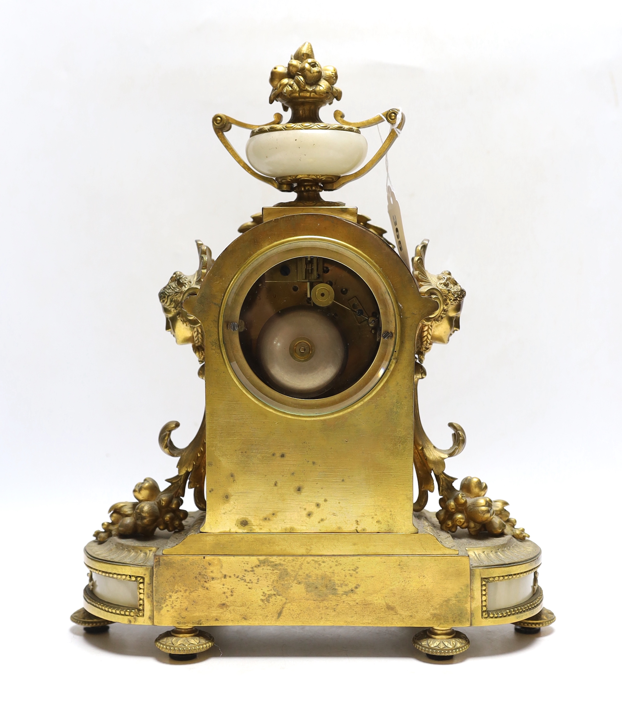 A late 19th century French gilt metal and alabaster mantel clock, 34cm